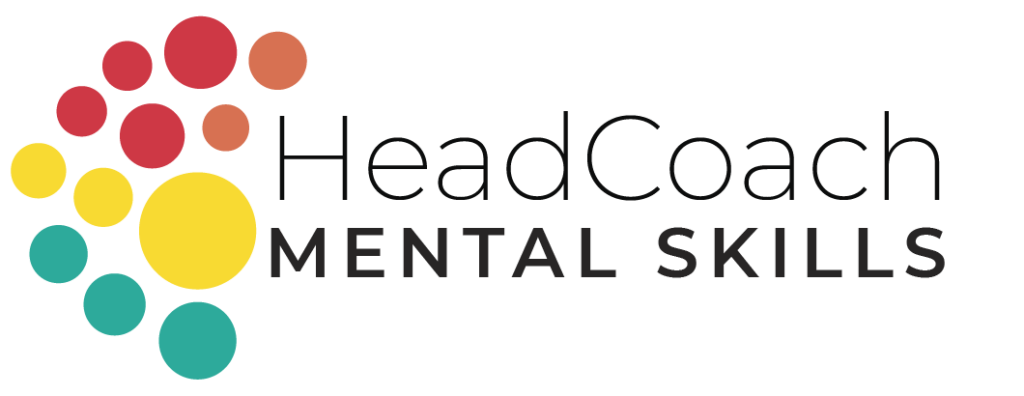 head coach logo - an image of coloured balls reflecting stages of development in the approximate formation of a brain hemisphere