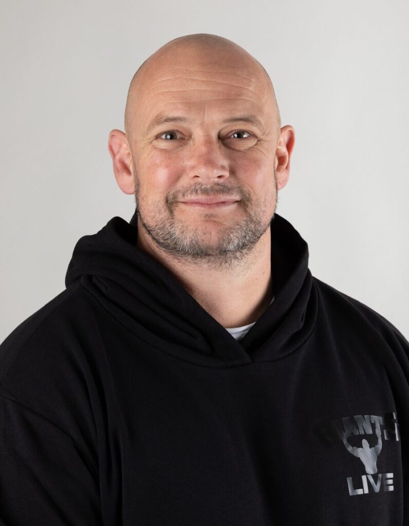 Photograph of John Dams facing camera